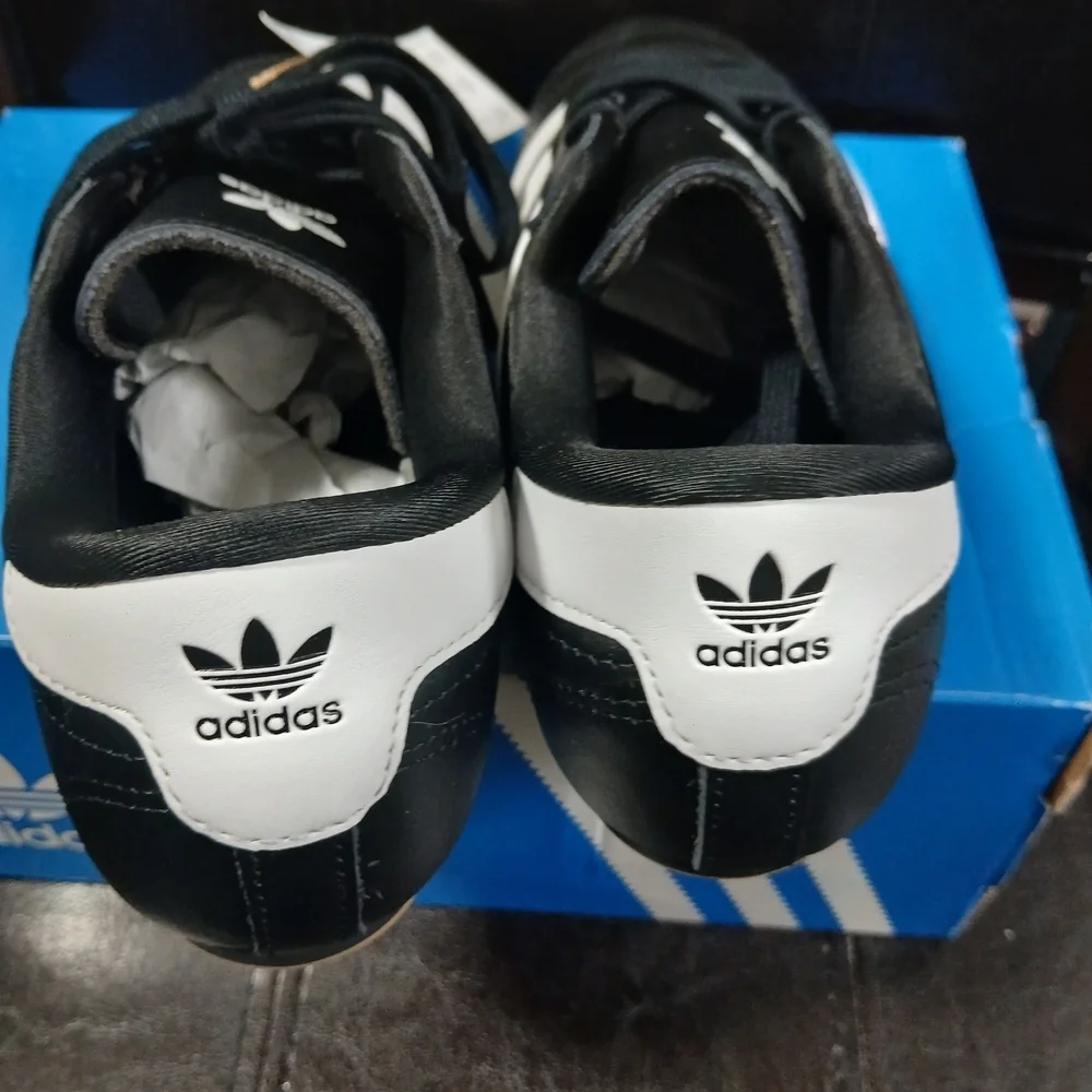 Adidas Men's Black Sneakers with White Stripes